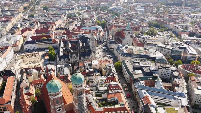 Aerial panoramic view of cityscape of Munich, Frauenkirche cathedral and Marienplatz square in historic city center, capital city of Bavaria from above - Germany, Europe