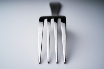 Fork & Spoon Kitchen Utensils fine art abstract on white isolated background