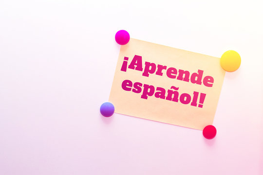 Fridge (refrigerator) note with text: &iexcl;Aprende espa&ntilde;ol! ("Learn Spanish" in Spanish)