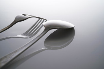 Fork & Spoon Kitchen Utensils fine art abstract on white isolated background
