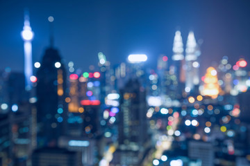 Blurred abstract background lights, beautiful cityscape view of Kuala lumpur city skyline at night...