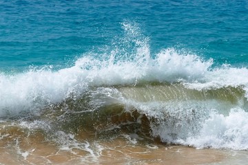 Waves lapping to the shore - obrazy, fototapety, plakaty