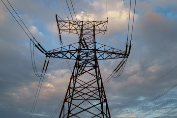 High power electricity poles in urban area. Energy supply, distribution of energy, transmitting...
