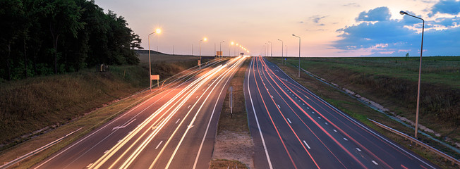 Highway traffic in sunset, border design panoramic banner 