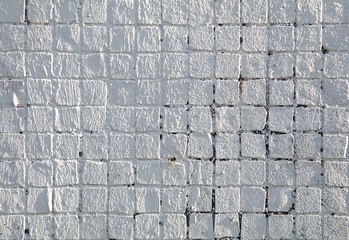 Painted mosaic brick tile wall, close up of graffiti texture, with vibrant colors for creativity, imaginative backgrounds and ideas.