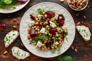 Healthy Beet Salad with chickpeas, pistachios nuts, feta and melted cheese toast
