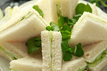 Cucumber sandwiches with soft cheese, sea salt and water cress for tea party