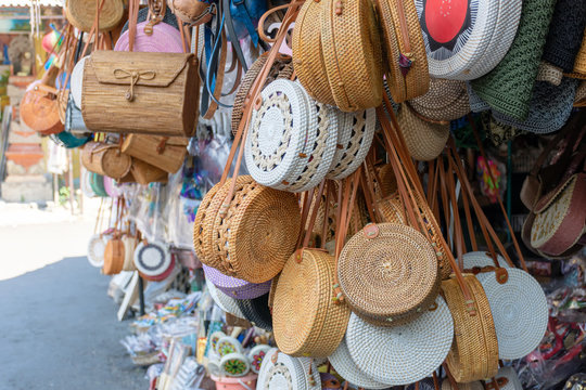 Balinese handmade rattan eco bags in a local souvenir market in Bali, Indonesia