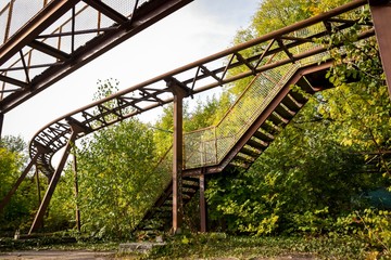rusted old rollercoaster in lost adventure park