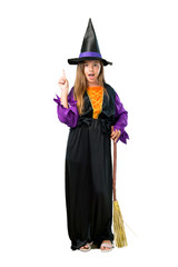 A full-length shot of a Little girl dressed as a witch for halloween holidays standing and thinking an idea isolated on white