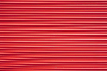 Red painted shutter or roller blind