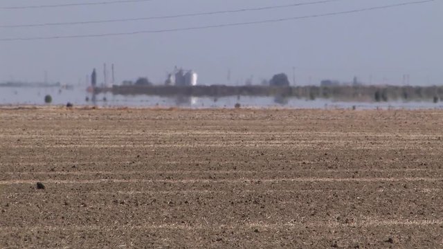 Typical soil in dry regions of California with heat haze or Fata Morgana.