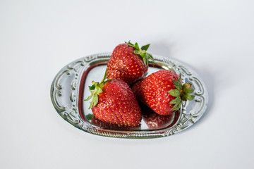 Isolated fruits - Strawberries on small salver 