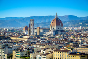 Fototapeta na wymiar Panoramic view of the old town of Florence, Italy during the sunset with the view of famous Santa Maria del Fiore Cathedral.
