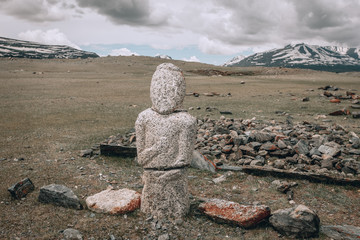 Ancient gravestones in the steppes of the Mongolia. Mongolian Cemetery