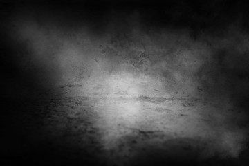 Background of an empty dark room. Empty walls, lights, smoke, glow, rays