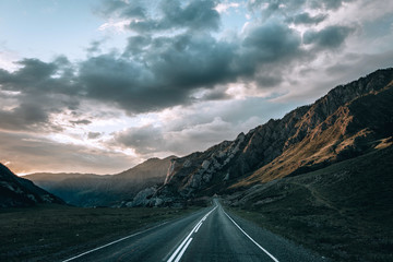 Mountain road in Altai. Sunset in Altay mountains