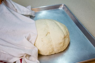 Fresh Raw Dough Ball In Baking Tray