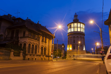 Fototapeta na wymiar old watch tower in Bucharest city, night view