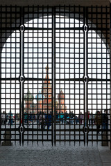 MOSCOW, RUSSIA - September 30, 20018: View on the Red Square through the lattice of the gate.