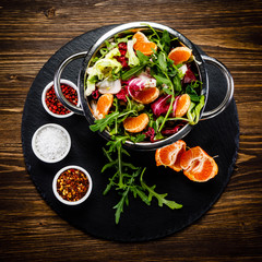 Vegetable salad on wooden background