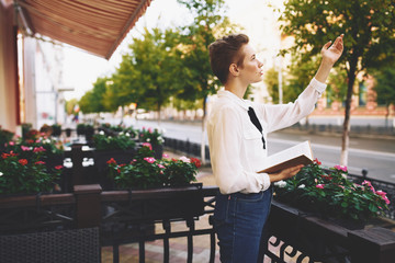 business woman in a cafe on the street