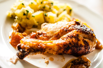 Grilled chicken drumsticks with boiled potatoes