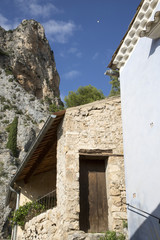 Fototapeta na wymiar The tenth century village of Moustiers-Sainte-Marie in the Alpes-de-Haute-Provence. With the Etoile de Moustiers