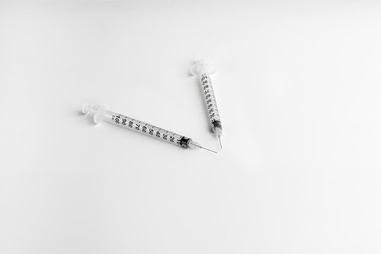 Two empty syringe closeup isolated on white background. Syringe 1ml for subcutaneous injections. Insulin syringe. A high resolution