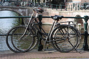 Fototapeta na wymiar Bicycles on an Amsterdam bridge.