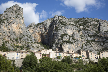 Fototapeta na wymiar The tenth century village of Moustiers-Sainte-Marie in the Alpes-de-Haute-Provence. With the Etoile de Moustiers