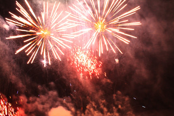  Fireworks. Salute. Sky background Amazing extravaganza of bright scarlet sparkling lights in the...