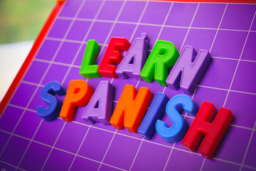 learn spanish language alphabet on magnets letters
