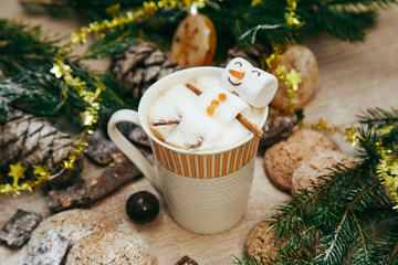 christmas happy marshmallow man in a cup of coffee