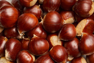 Sweet chestnut on wooden background