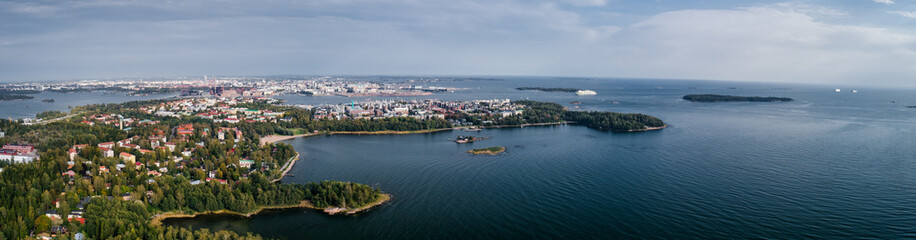 Fototapeta na wymiar Panorama view from the sky of Helsinki with car ferries arriving to the West Harbour, Finland