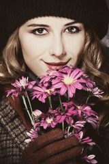 Naklejka premium Style girl with flowers and bokeh at background.