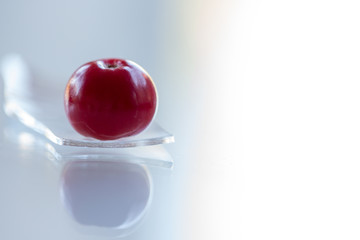 wild red apples on glass ground,