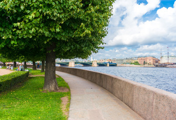 The Spit of Vasilyevsky Island and the view of the Birzhevoy Bridge in the summer in St. Petersburg. Russia