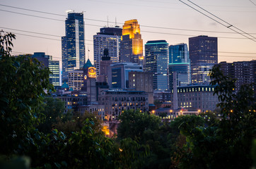 Cityscape skyline of Downtown Minneapolis Minnesota in the Twin Cities Metro area. Long exposure, night.