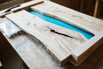 Unfinished wooden table top in joinery