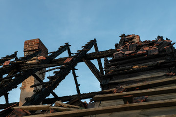 An old burnt house. He ruins after the fire of the building intended for habitation.