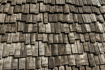 Rustic wood and bark cladding.