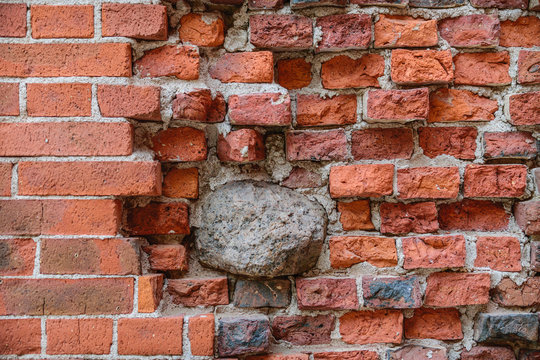 old red brick wall with stone texture background high resolution © Roman