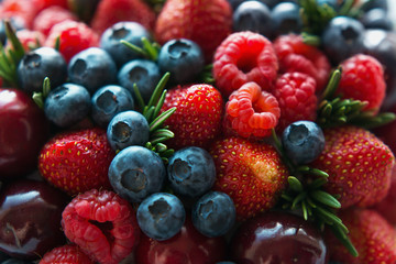 Set of various fresh summer berries.  Mix of raspberries, blueberries, cherries, strawberries, blueberries.