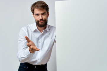 man holds in his hand mockup, poster