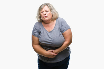 Senior plus size caucasian woman over isolated background with hand on stomach because indigestion,...