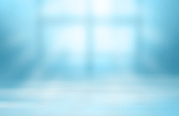 Blurred Lights from windows to room filtered blue color tones.