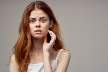 surprised look woman loose hair gray background problem skin