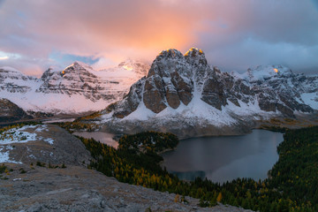 A brilliant alpenglow illuminates the sunset sky over Sunburst Peak